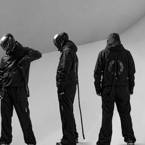 Black Hooded Techwear Windbreaker seen on three people from the front, the side and the back, strap hanging