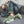 Breathable mesh techwear sneakers in green, three quarter front view