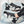 Breathable mesh techwear sneakers worn with slim trousers, styling shot