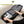 Black business backpack with a structured shell body and side water bottle pocket
