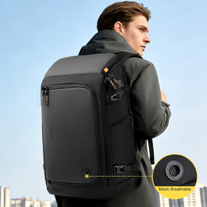 Black business backpack with a structured shell body and side water bottle pocket