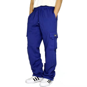 Royal blue men's sweatpants with a drawstring waist and thigh cargo pocket, front view