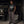 The model stands facing the camera, the boxy cut sitting short and square above the waistband
