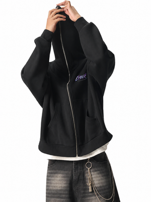 Chrome Y2K Zip Up Hoodie zipped shut over the head and face, arms raised, showing the boxy body