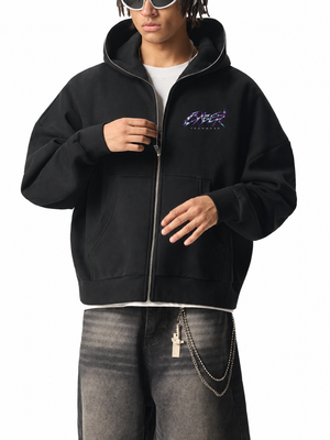 Front view of the Chrome Y2K Zip Up Hoodie worn open, with the small chrome mark on the left chest