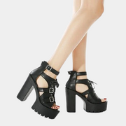 Schwarze Chunky Absatz-Sandalen