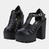 Sandalias negras con tacones gruesos