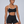 Color Block Cyber Sports Bra in black on a model, front view, white trim around the sweetheart neckline