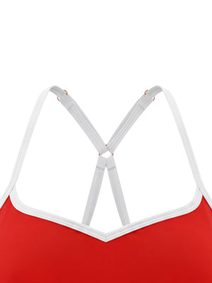 Close-up of the red front, the white trim dipping into the V of the sweetheart neckline