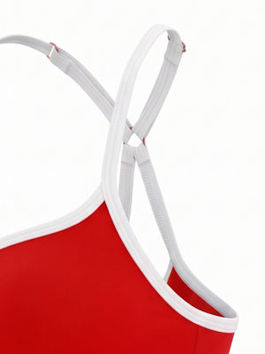 Close-up of a white strap with its slider and the small ring where the straps join at the back