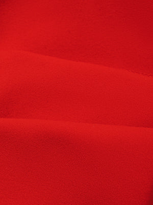 Close-up of the red knit, a thin and smooth nylon and spandex fabric with a soft sheen