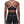 A model seen from behind in the black sports bra, the Y back and the white trim across the band