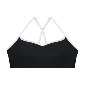 Black colourway laid flat from the front, the white trim outlining the neckline and the straps