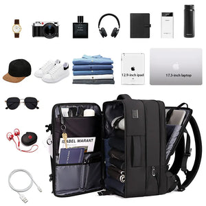 Black nylon commuter backpack with a padded back panel and a top grab handle