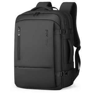 Black nylon commuter backpack with a padded back panel and a top grab handle