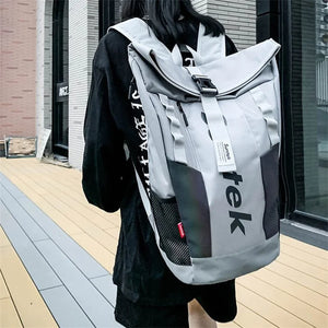 Compact techwear backpack under 20 litres with a laptop compartment