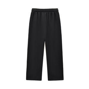 Black baggy sweatpants laid flat from the back, plain back with an elastic waistband and straight legs
