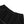 Close-up of the elastic waistband on the black sweatpants, with a grey contrast seam curving below it