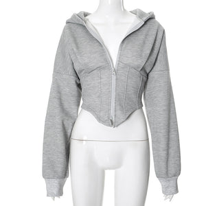 Grey zip up hoodie on a mannequin, front view half open, corset panel seams and long cuffed sleeves