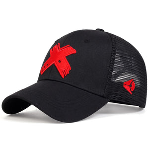 Black trucker cap with a red cross patch and mesh back