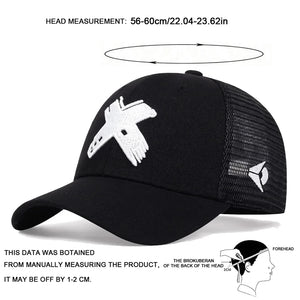 Black trucker cap with a red cross patch and mesh back