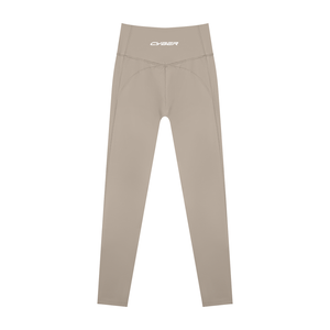 Back of the khaki yoga leggings laid flat, the V seam meeting under the CYBER waistband