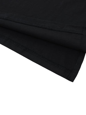 Close-up of the side slit at the hem, both edges stitched flat where the side seam opens