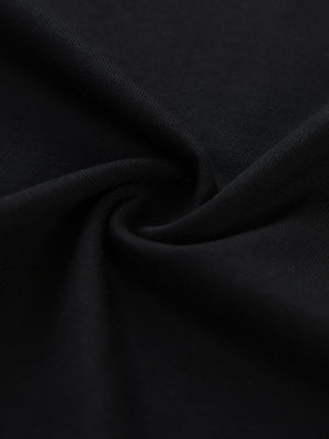 The black cotton and spandex fabric twisted to show its soft, lightly stretchy 200 gsm knit