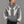 Man in a black beanie wearing the Grey Y2K Harajuku zip hoodie, front view of the curved cream panels, hood down