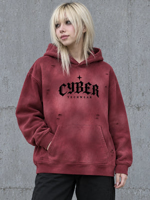 Model with a blonde fringe in the Dark Red distressed hoodie, front view of the CYBER TECHWEAR print and pocket