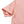 Close-up of the pink sleeve hem seen from the side and the stitched armhole of the washed crop top