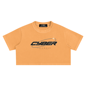 Orange washed crop top laid flat, front view with the black CYBER wordmark, orbit ring and star on the chest