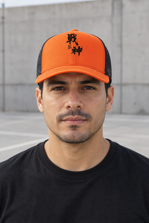 Kanji Mesh Trucker Hat – Orange – front view on model