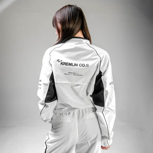 Cyberpunk Racing Jacket in white, back view on a model with printed lettering and black side panels