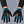 Cyberpunk Techwear Gloves worn by a person, close-up on both hands, front view on a grey studio background
