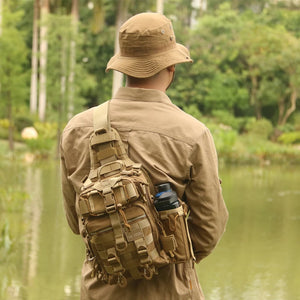 Black and sand cycling techwear sling bag worn across the body