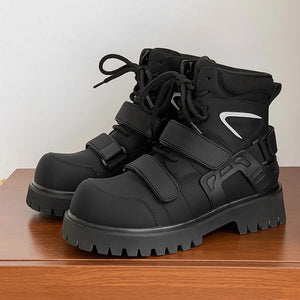 Deconstructed high top techwear boots in black, side profile view