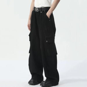 Pantalon droit noir déconstruction