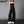Black denim strapless jumpsuit with multiple cargo pockets and a wide leg