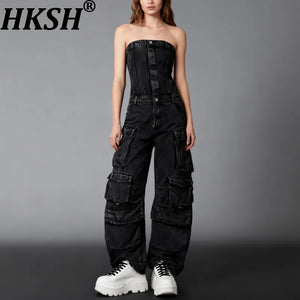 Black denim strapless jumpsuit with multiple cargo pockets and a wide leg
