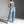 Black denim strapless jumpsuit with multiple cargo pockets and a wide leg