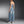 Black denim strapless jumpsuit with multiple cargo pockets and a wide leg