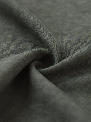 Close-up of the 270 gsm cotton jersey, showing the dense knit and the mottled garment wash finish