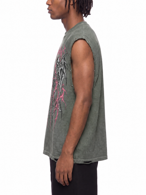 Side view on a male model in washed grey, dropped shoulder, wide armhole and a row of metal eyelets