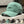 Green distressed baseball cap with script embroidery and a brim ring