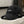 Green distressed baseball cap with script embroidery and a brim ring