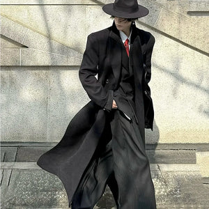 Black and grey double breasted techwear coat with padded shoulders