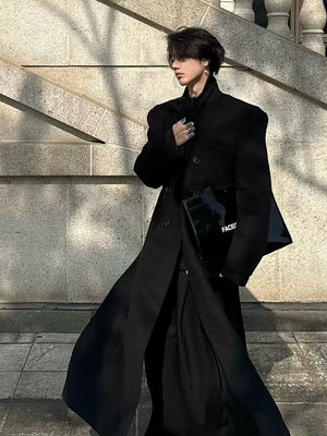 Black and grey double breasted techwear coat with padded shoulders