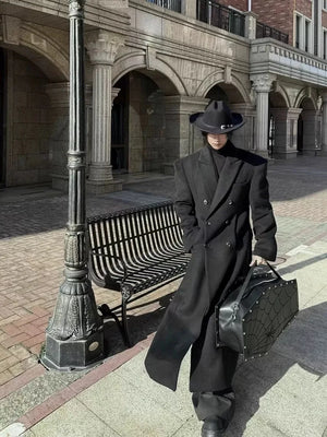 Black and grey double breasted techwear coat with padded shoulders