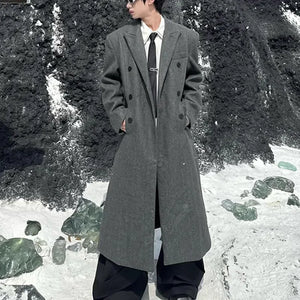 Black and grey double breasted techwear coat with padded shoulders